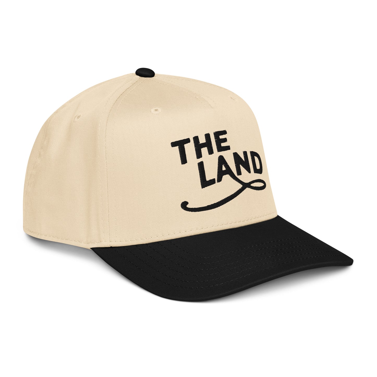 Beige and black cap with 'THE LAND' text on a white background