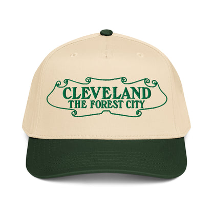 Beige and green cap with 'Cleveland The Forest City' text on a white background