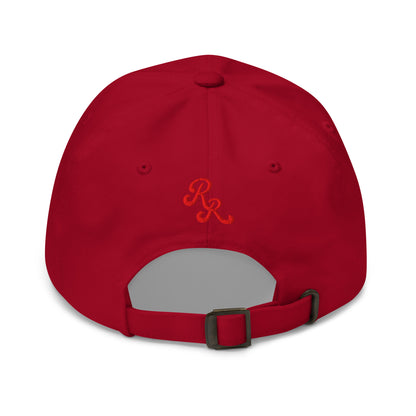Red cap with a logo on the back against a white background