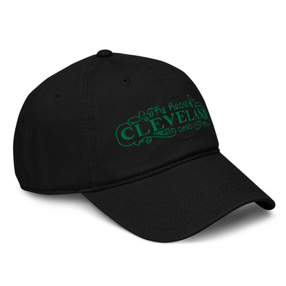 Black cap with green text on a white background