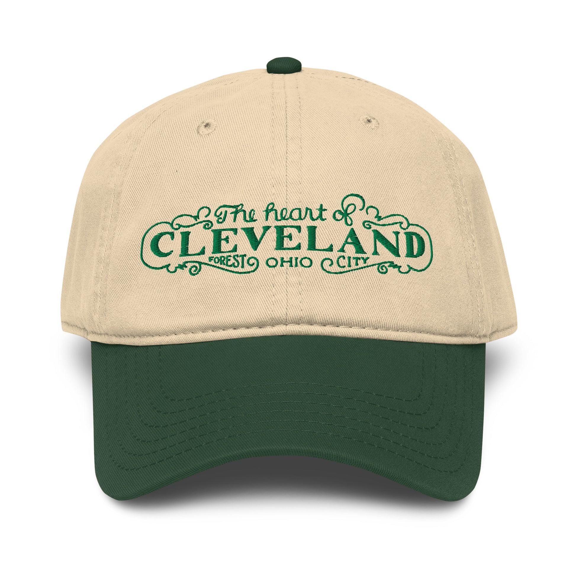 Beige and green cap with 'The heart of Cleveland, Forest City Ohio' text on a white background