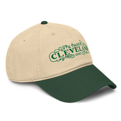 Beige and green cap with 'The heart of Cleveland, Forest City Ohio' text on a white background