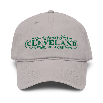 Gray cap with green text 'The heart of Cleveland, Forest City Ohio' on a white background
