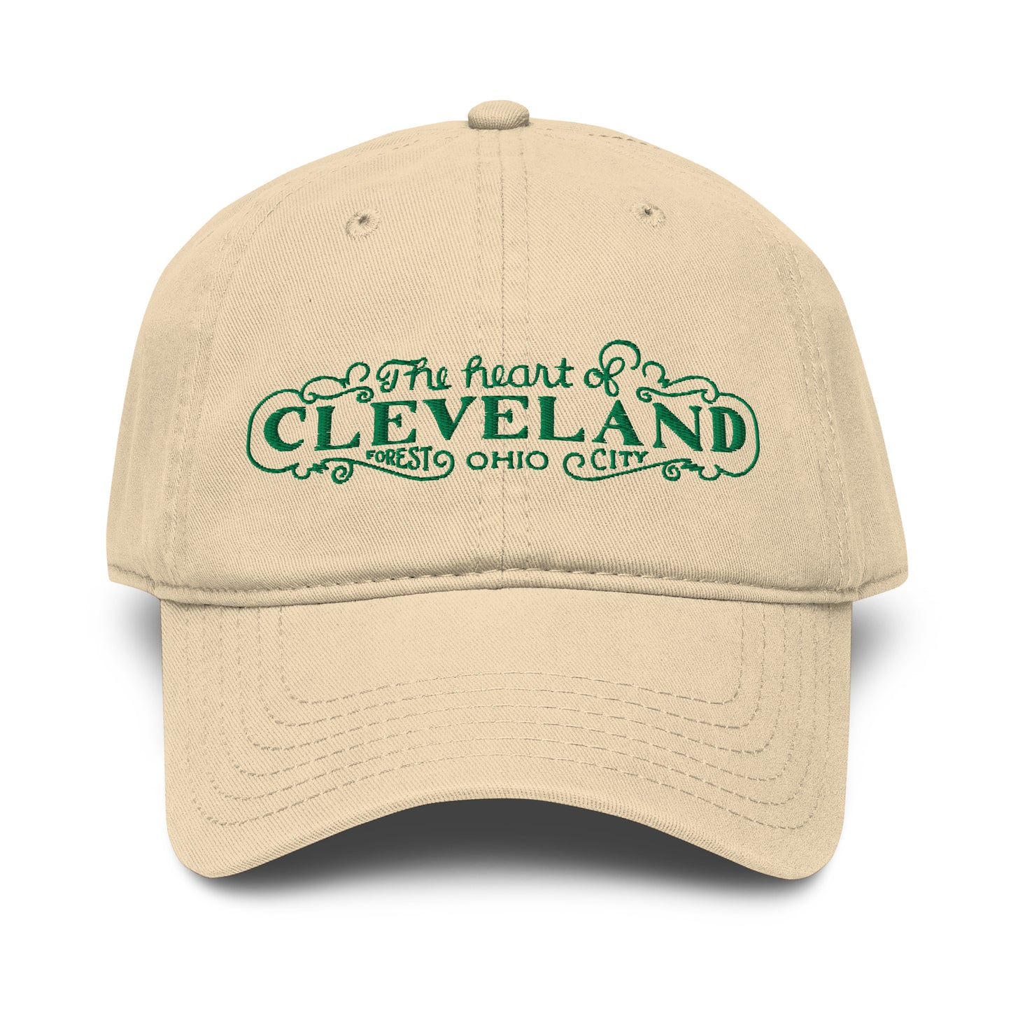 Beige cap with green text 'The heart of Cleveland, Forest City Ohio' on a white background