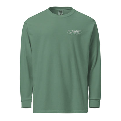 Green long-sleeve shirt with a logo on the chest against a white background