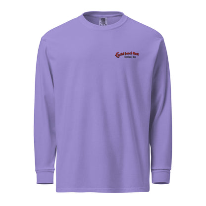 Purple long-sleeve shirt with a logo on the chest against a white background