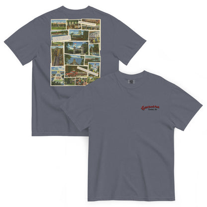 Gray t-shirt with vintage-style collage on the back and logo on the front, displayed on a white background.