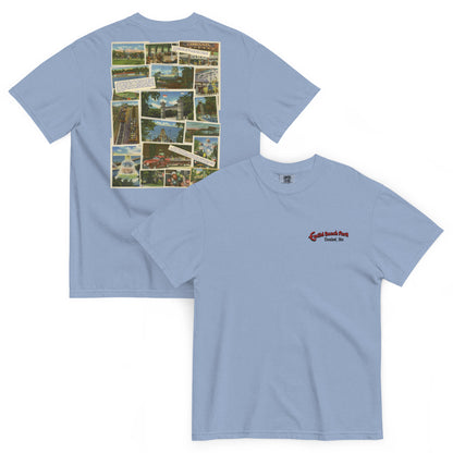 Light blue t-shirt with collage on front and logo on back, displayed on a white background.